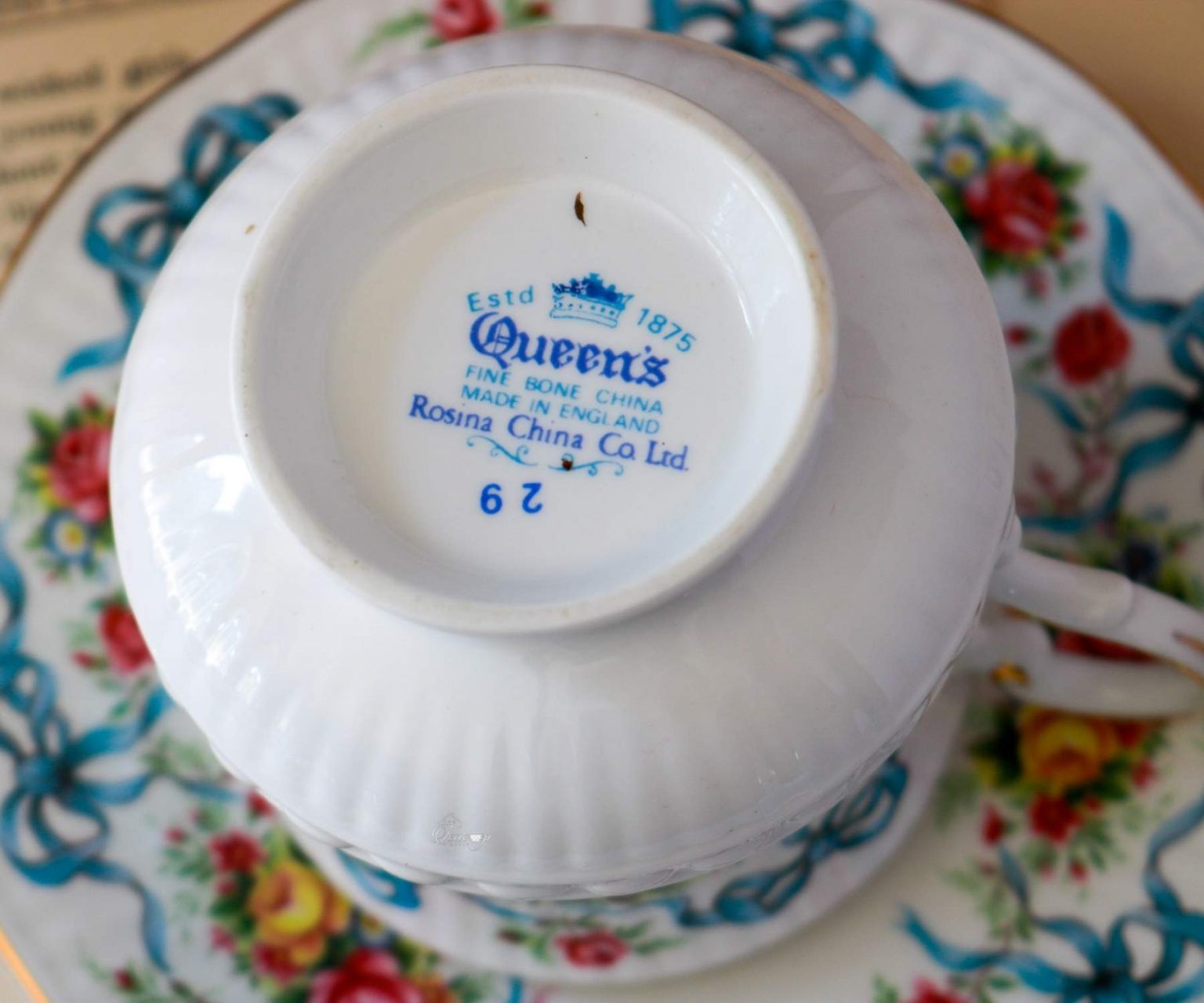 Queen's Bone China Teacup and Saucer With Ribbons and Flowers The