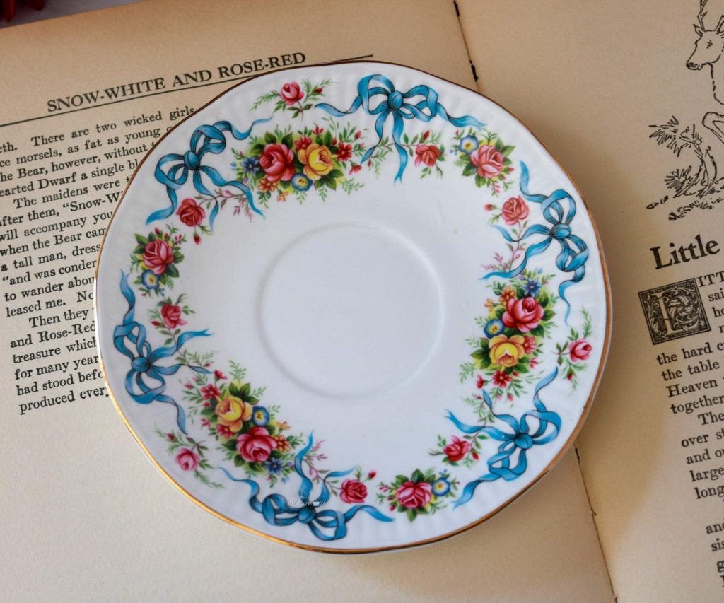 Queen's Bone China Teacup and Saucer With Ribbons and Flowers The